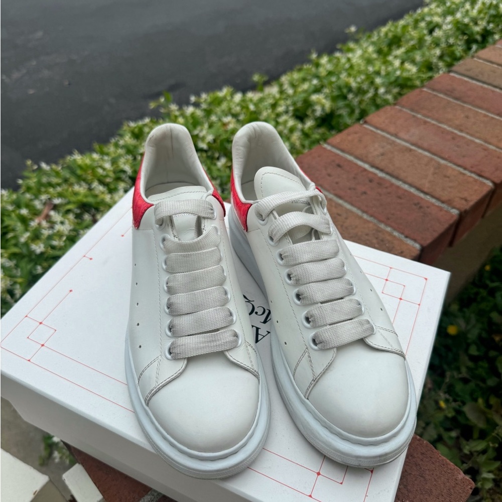 White Sneakers with Red Accents